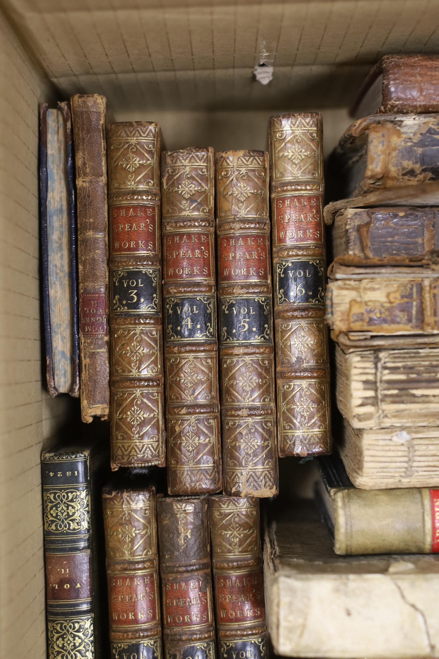 A group of assorted leather bindings